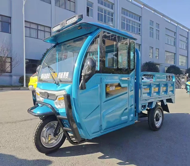 Triciclo de carga eléctrico con cobertizo